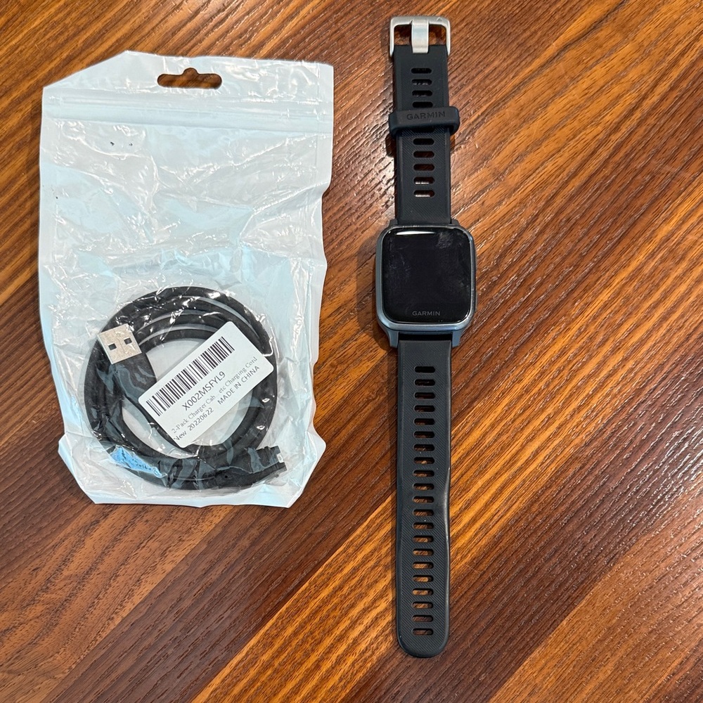 Garmin Black Fitness Watch with USB Cable